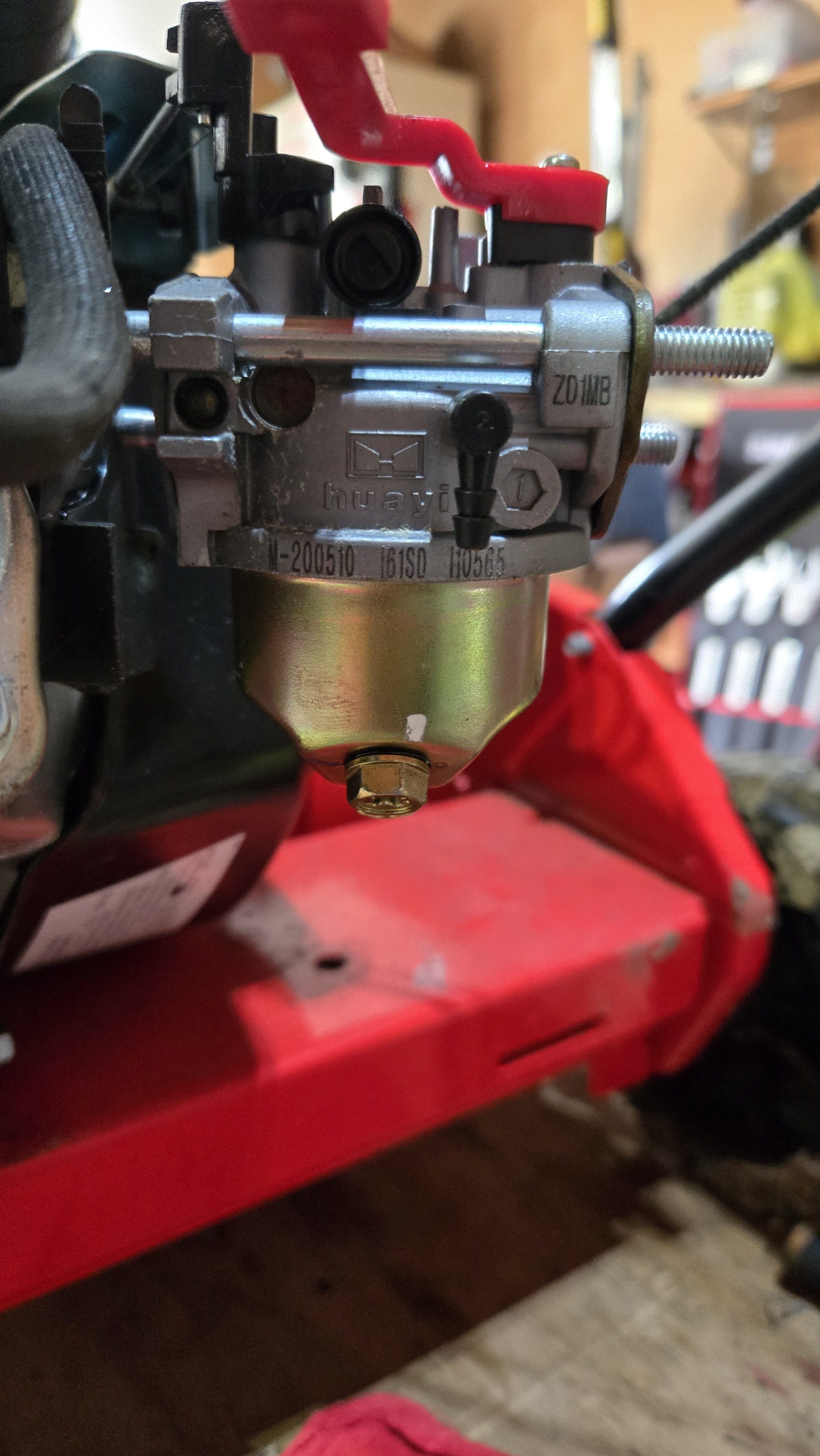 Small engine carburetor repair